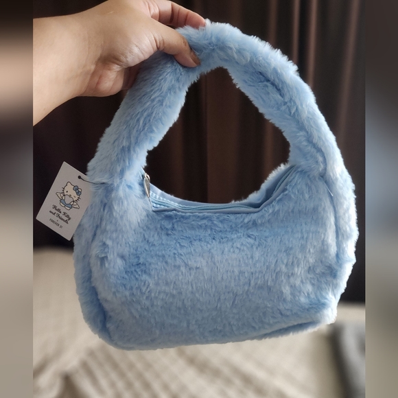Jayley - Borsa in pelliccia sintetica blu acceso | ASOS